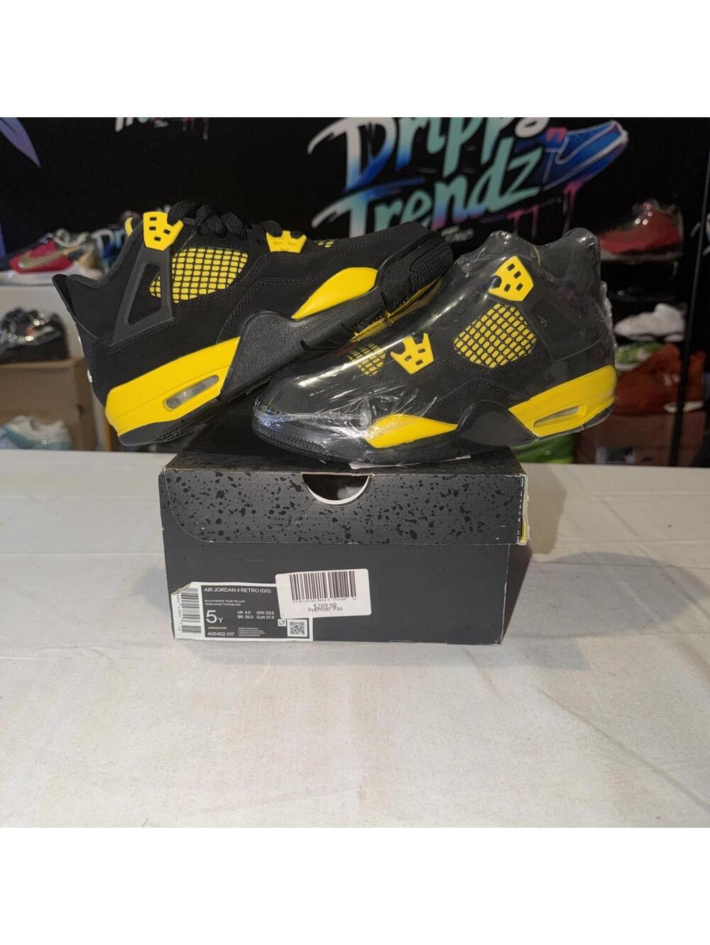 Size 5 - Jordan 4 Retro Mid Thunder